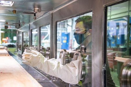 Man reaching into glovebox